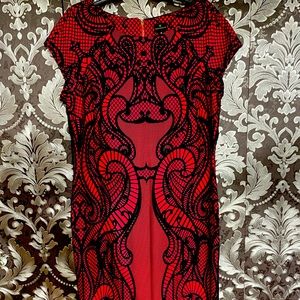 Red dress with black suede prints